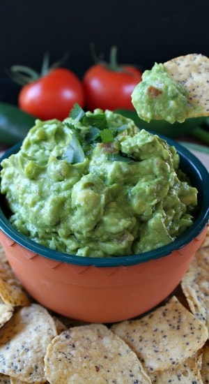 A serving bowl filled with Fresh Spicy Guacamole