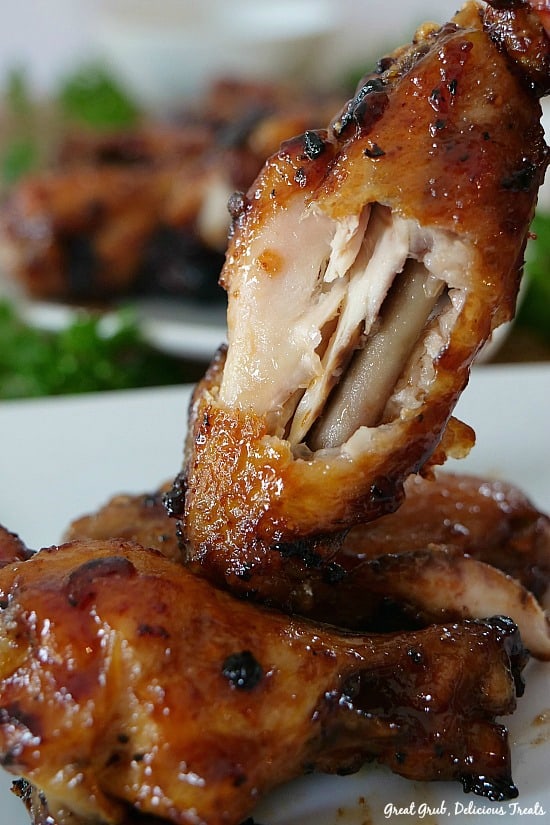 Honey Barbecue Chicken Wings are baked wings that are smothered in a delicious honey barbecue sauce. #chickenwings #honeybbqwings #appetizers #barbecuewings #greatgrubdelicioustreats