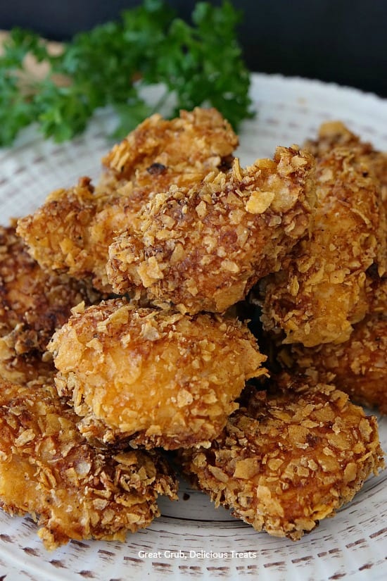 Freakin' Hot Chicken Nuggets are delicious and spicy! Coated in spicy, crushed corn tortilla chips, then fried. Super delish. #spicy #chicken #nuggets #appetizers #chickenfoodrecipes   #greatgrubdelicioustreats