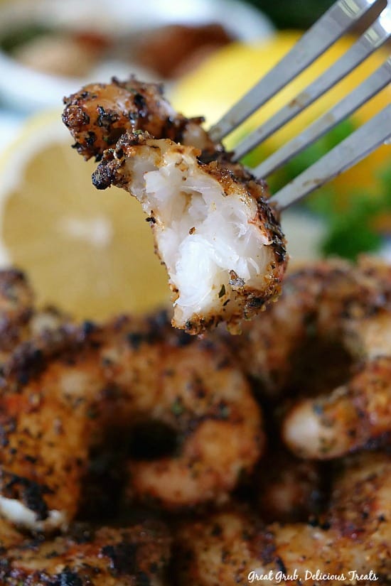 This grilled Cajun lemon shrimp is seasoned just right in a Cajun dry rub, then drizzled with fresh squeezed lemon juice. #delicious #dinner #shrimp #spicyfood #appetizers #greatgrubdelicioustreats