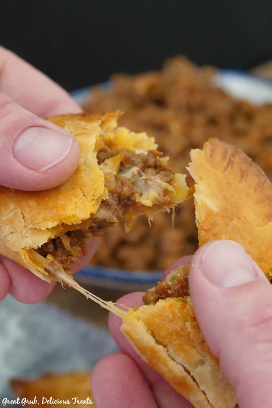 Cheesy Ground Beef Empanadas are just that, loaded with two types of cheese and seasoned meat, then baked. 
