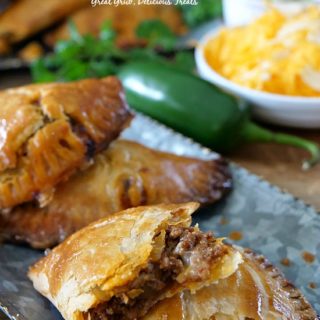 Cheesy Ground Beef Empanadas are loaded with seasoned ground beef, two types of cheese and then baked to perfection.