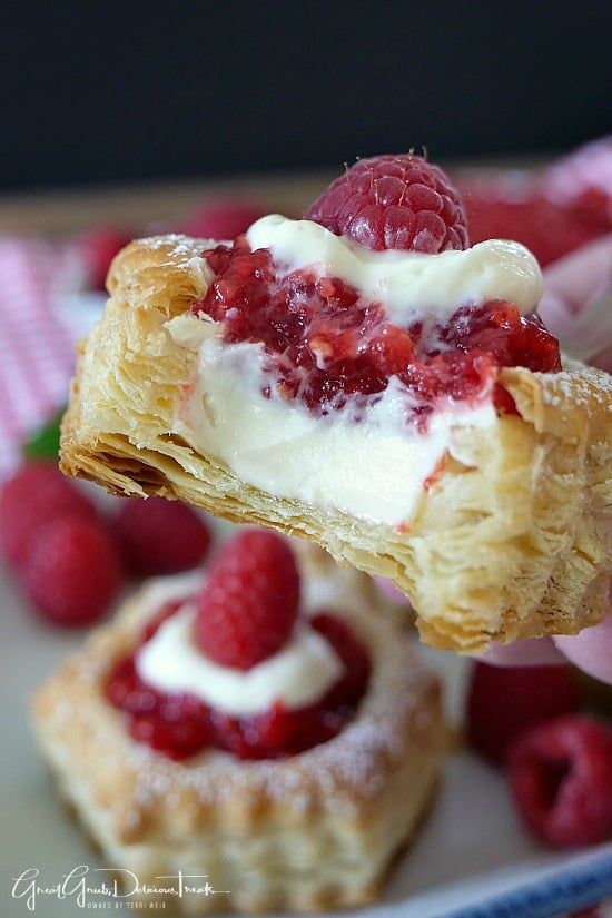 Raspberry Cream Cheese Pastries are a flaky puff pastry filled with a delicious cream cheese and raspberry filling.