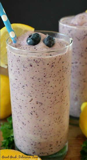 Blueberry Frosted Lemonade is made with lemonade, creamy vanilla ice cream and loaded with blueberries.