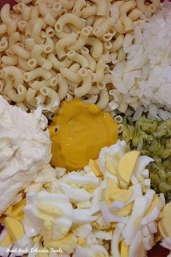 Deviled Egg Macaroni Salad is made with elbow macaroni, eggs, dill relish, onions, mayonnaise and mustard.