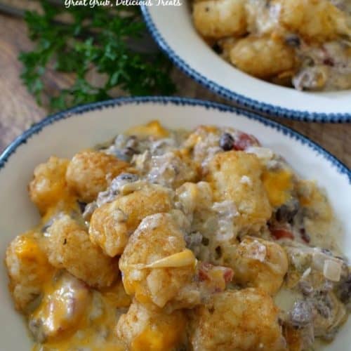Mexican Tater Tot Casserole is loaded with ground beef, cheese, black beans, sour cream, tater tots.