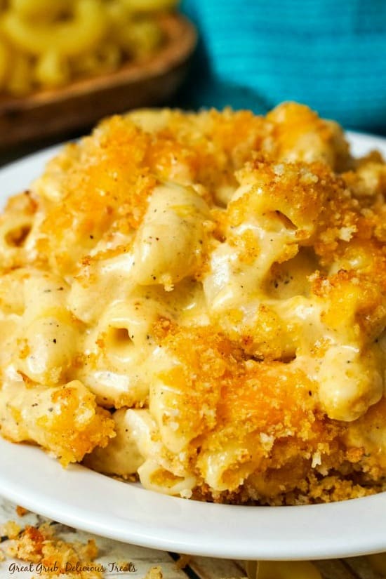 Homemade Creamy Macaroni and Cheese is loaded with cheesy goodness, topped with a crunchy topping.