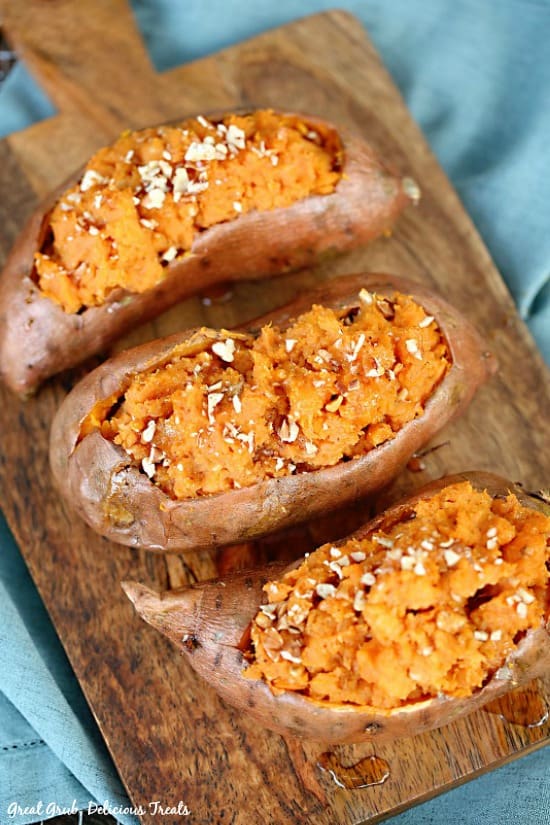 Maple Pecan Sweet Potatoes are full of brown sugar, cinnamon, nutmeg, maple syrup and chopped pecans.