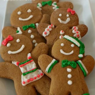 Gingerbread Cookies are decorated like boy and girl gingerbread cookies.