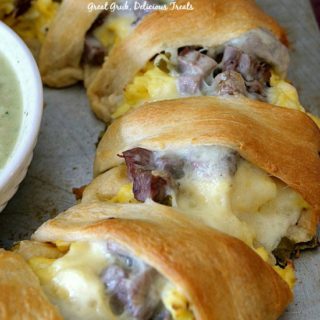 Rib Eye Breakfast Pastry Ring is loaded with leftover rib eye, scrambled eggs, cheese, jalapenos, onions in a crescent pastry ring.