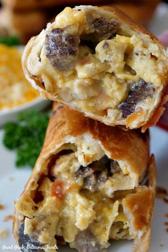 Fried Rib Eye Breakfast Burritos are fried to perfection, filled with scramble eggs, rib eye, cheese, onions and more. 