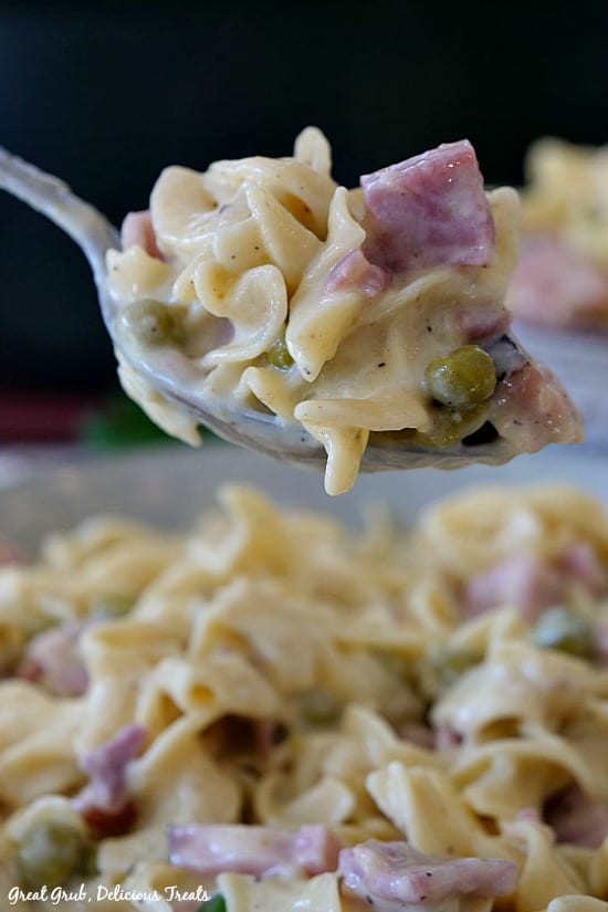 One Pot Ham and Noodle Casserole is an easy dinner recipe loaded with ham, pasta, peas and a creamy sauce.