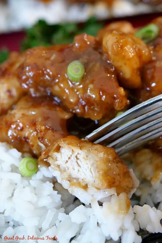 Orange Teriyaki Chicken is deep fried then smothered in a delicious sticky orange teriyaki sauce.