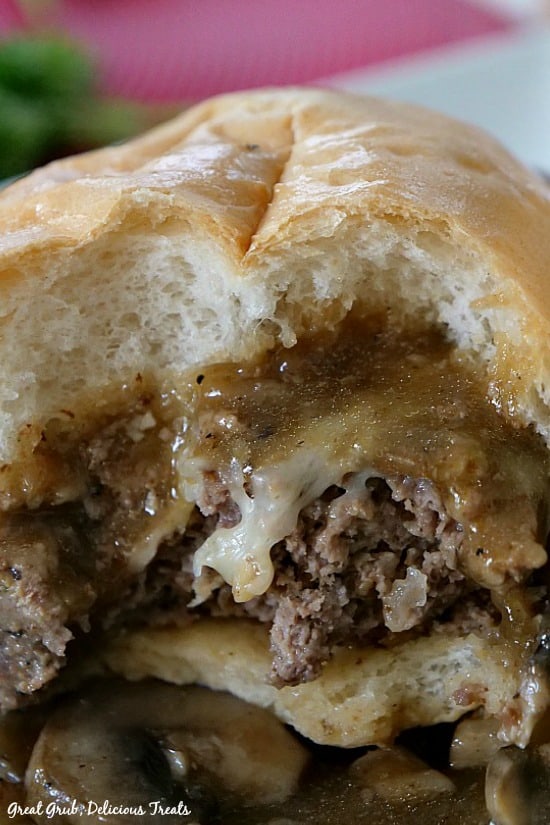 Salisbury Steak Sandwiches are hearty, savory and flavorful, topped with Swiss cheese and onion mushroom gravy.