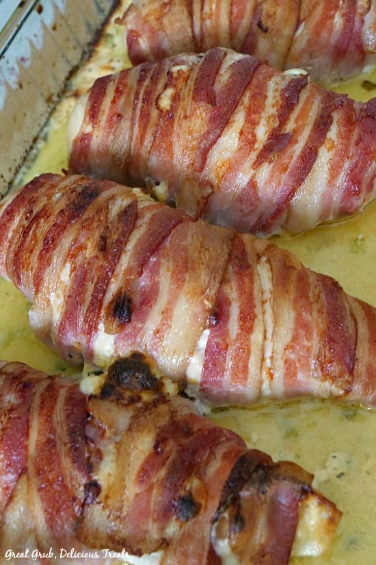 Bacon Wrapped Jalapeno Popper Chicken is chicken breasts wrapped in bacon after being filled with a cream cheese, jalapeno mixture.