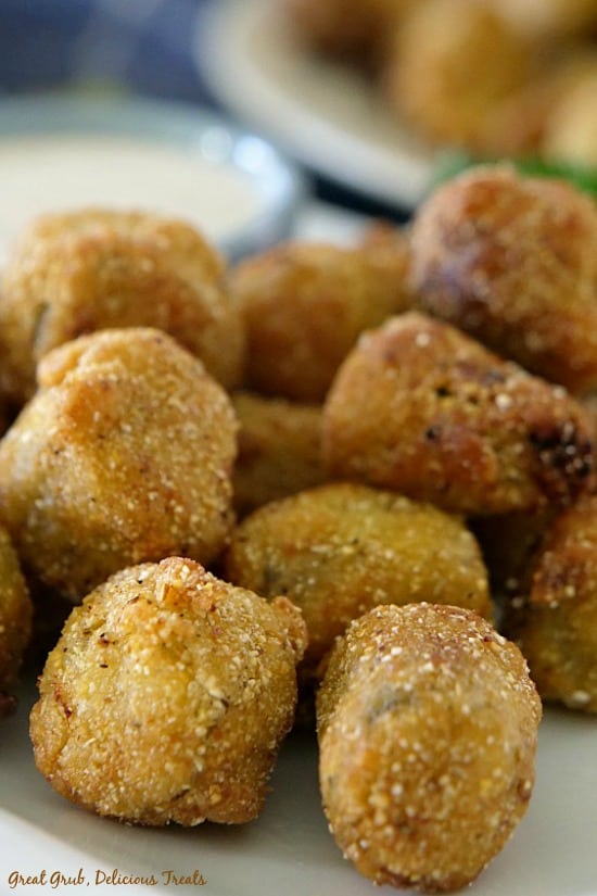 Spicy Fried Okra Nuggets is a close up picture of okra nuggets on a plate.