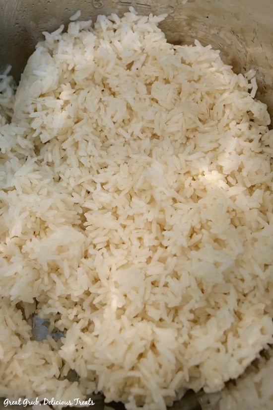 Instant Pot White Rice - a photo of fluffy white rice in the Instant Pot pan.