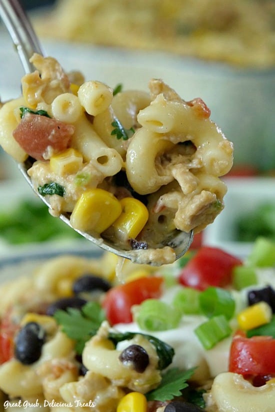Southwest Chicken Pasta Salad - a spoonful of chicken pasta salad on a spoon.