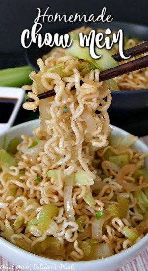 A close up photo of chopsticks picking up homemade chow mein noodles from a white bowl.