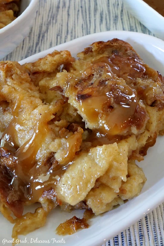 A serving of Caramel Bread Pudding in a white bowl.