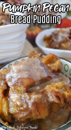 A bowl filled with pumpkin pecan bread pudding with another bowl in the background with the title of the recipe of the top of the photo.