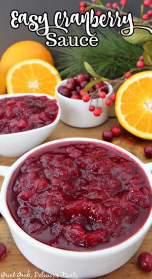 A close up of a white bowl filled with homemade cranberry sauce.