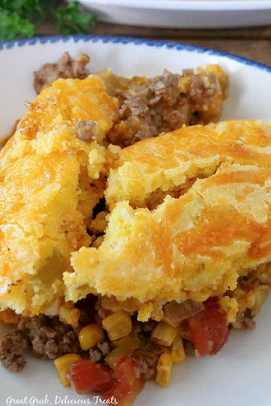 A close up picture of Tamale Pie on a white plate.