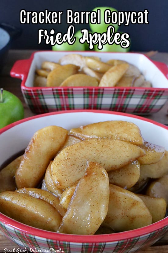 Two red plaid bowls filled with fried apples with green apples in the background.