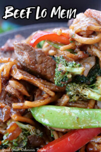 A close up photo of beef lo mein.