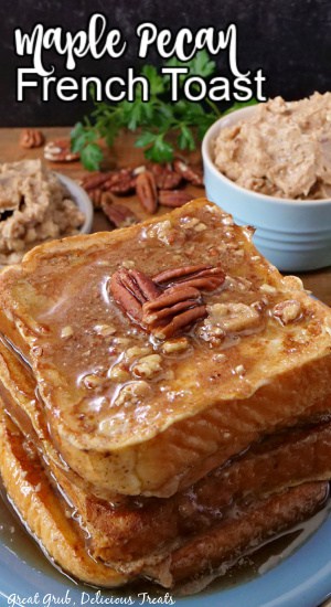 A stack of French toast on a blue plate, covered with syrup, pecans, and maple pecan butter.