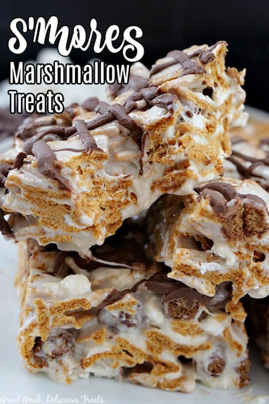 A close up of three pieces of marshmallow treats made with S'mores cereal.
