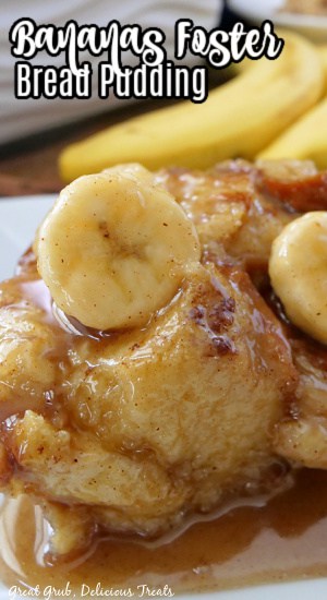 A serving of bread pudding with sliced bananas on top.