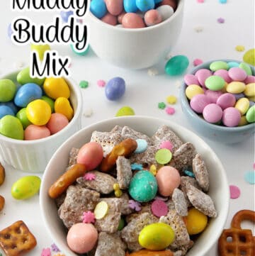 Bowls filled with pastel candies and muddy buddies themed Easter snack mix.