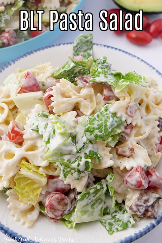 A large serving bowl filled with delicious BLT pasta salad.