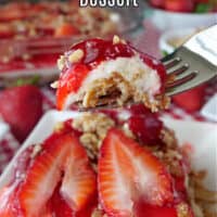 A white plate with a slice of strawberry pretzel dessert and a pan of pretzel dessert in the background.