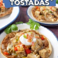 A title pic with a tostada topped with chicken, rice, beans, sour cream, and cheese.