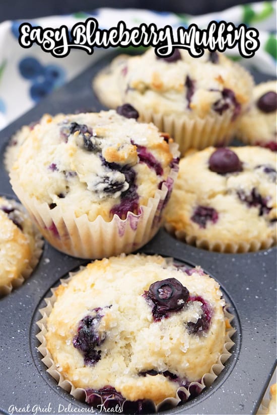 A muffin tin with freshly baked muffins in it. 