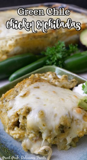 A serving of chicken enchiladas on a square green plate.