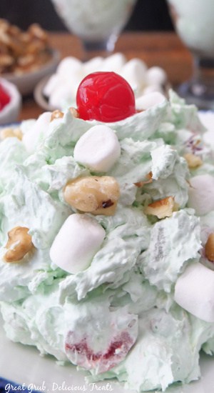 A close up of a serving of pistachio fluff or Watergate salad.