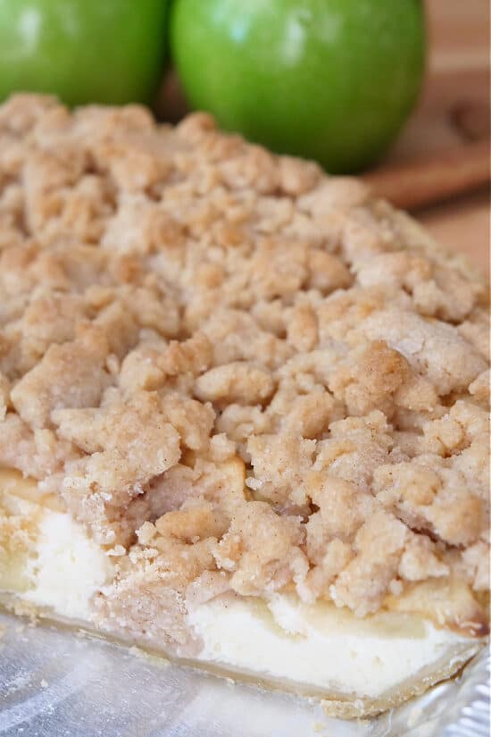 A close up of a slice of apple pie.