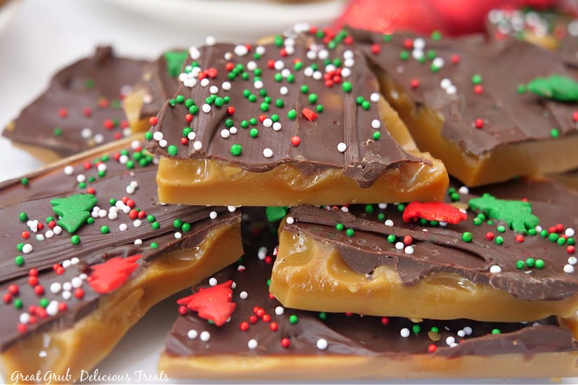 A small stack of toffee with holiday sprinkles on it.