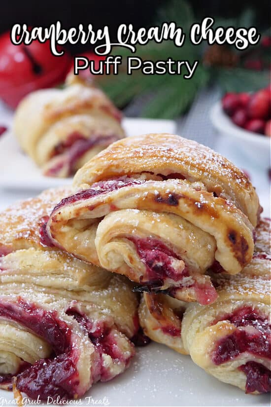 Three cranberry pastries on a white plate.