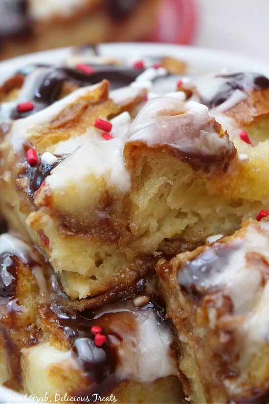 A super close up photo of peppermint mocha bread pudding in a white bowl.