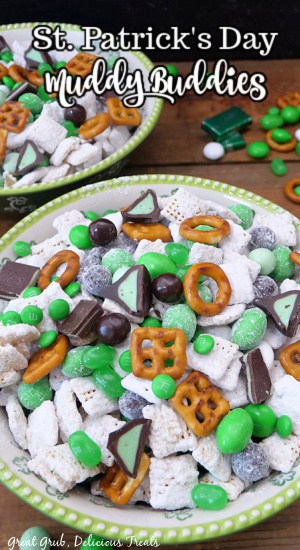Two green and white bowls filled with St. Patrick's Day muddy buddies mix.