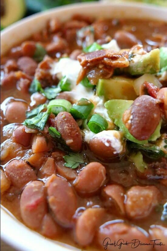 A close up of a bowl of charro beans.