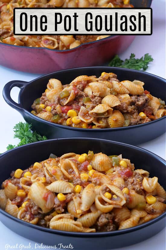 One Pot Goulash in two black oval serving bowls with the title at the top.