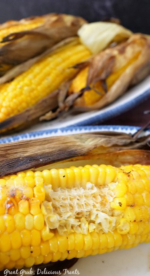 A bite taken out of a cob of corn.