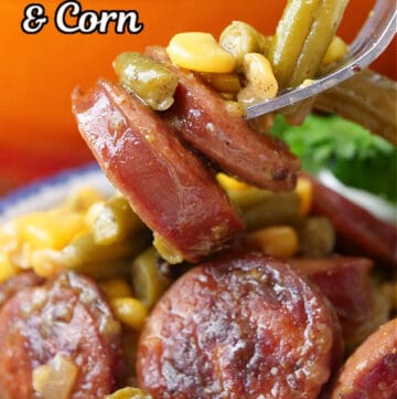 A close up of a fork with a bite of sausage, corn, green beans with the title of the recipe at the top of the photo.