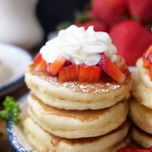 Mini Pancakes With Fresh Strawberries And Whipped Cream