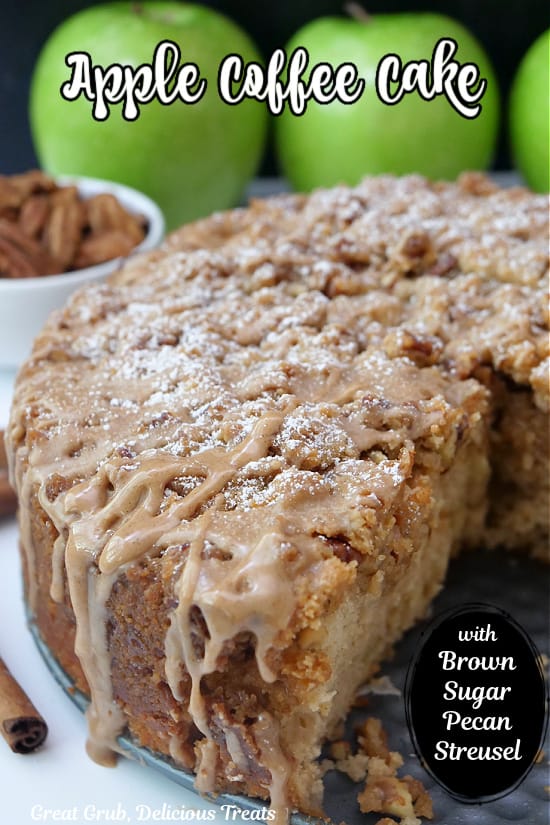 An apple coffee cake with green apples and pecans in the background.